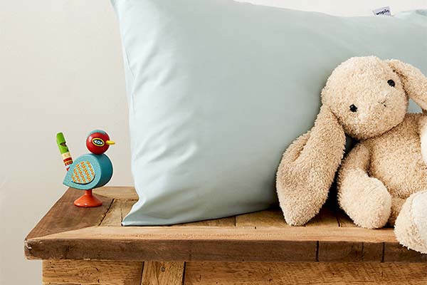 Choisir un oreiller pour son bébé : quand l'acheter, comment le placer –  Wopilo